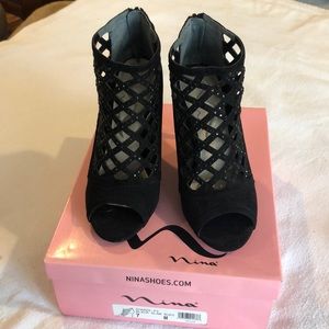 Fancy black booties with sequins